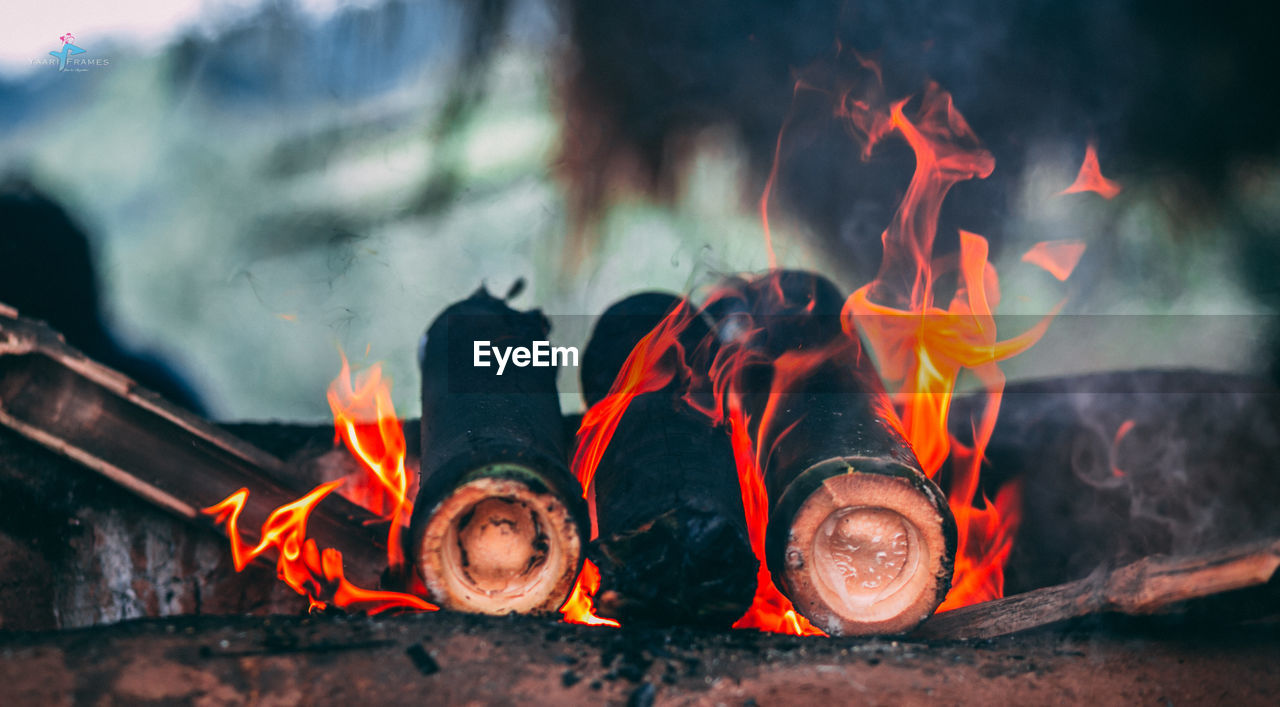 CLOSE-UP OF BONFIRE ON ORANGE