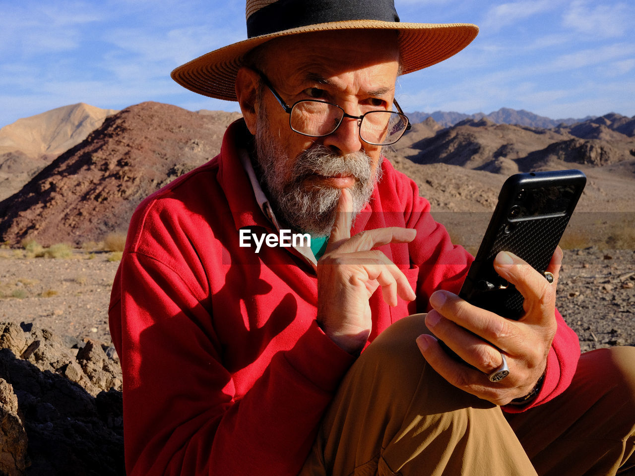 portrait of man using mobile phone