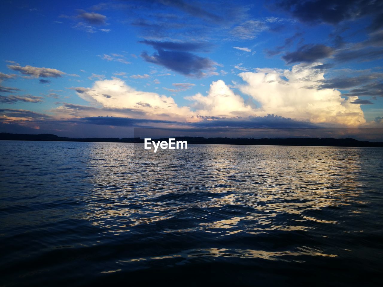 SCENIC VIEW OF SEA DURING SUNSET