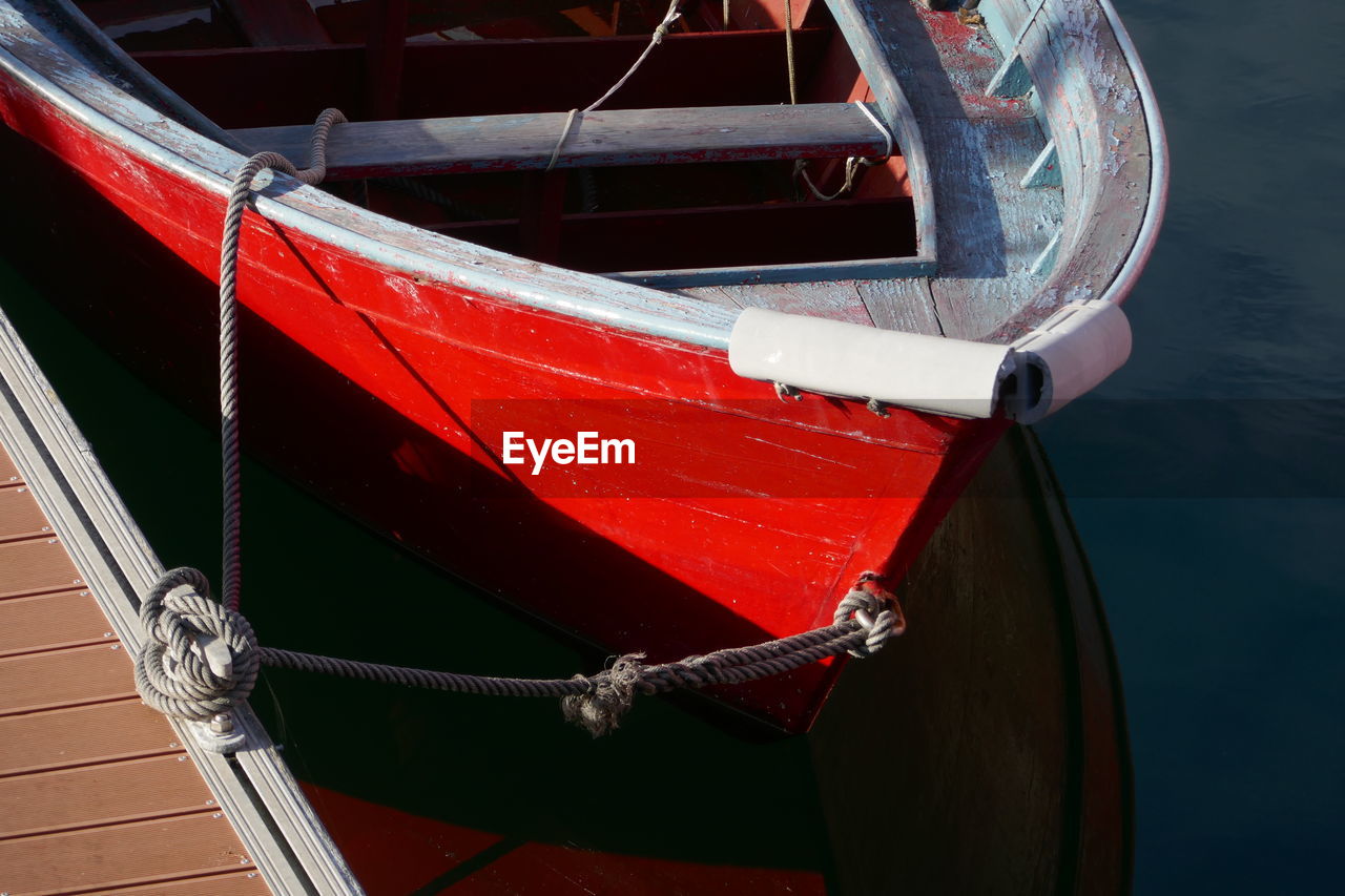 High angle view of ropes tied on boat