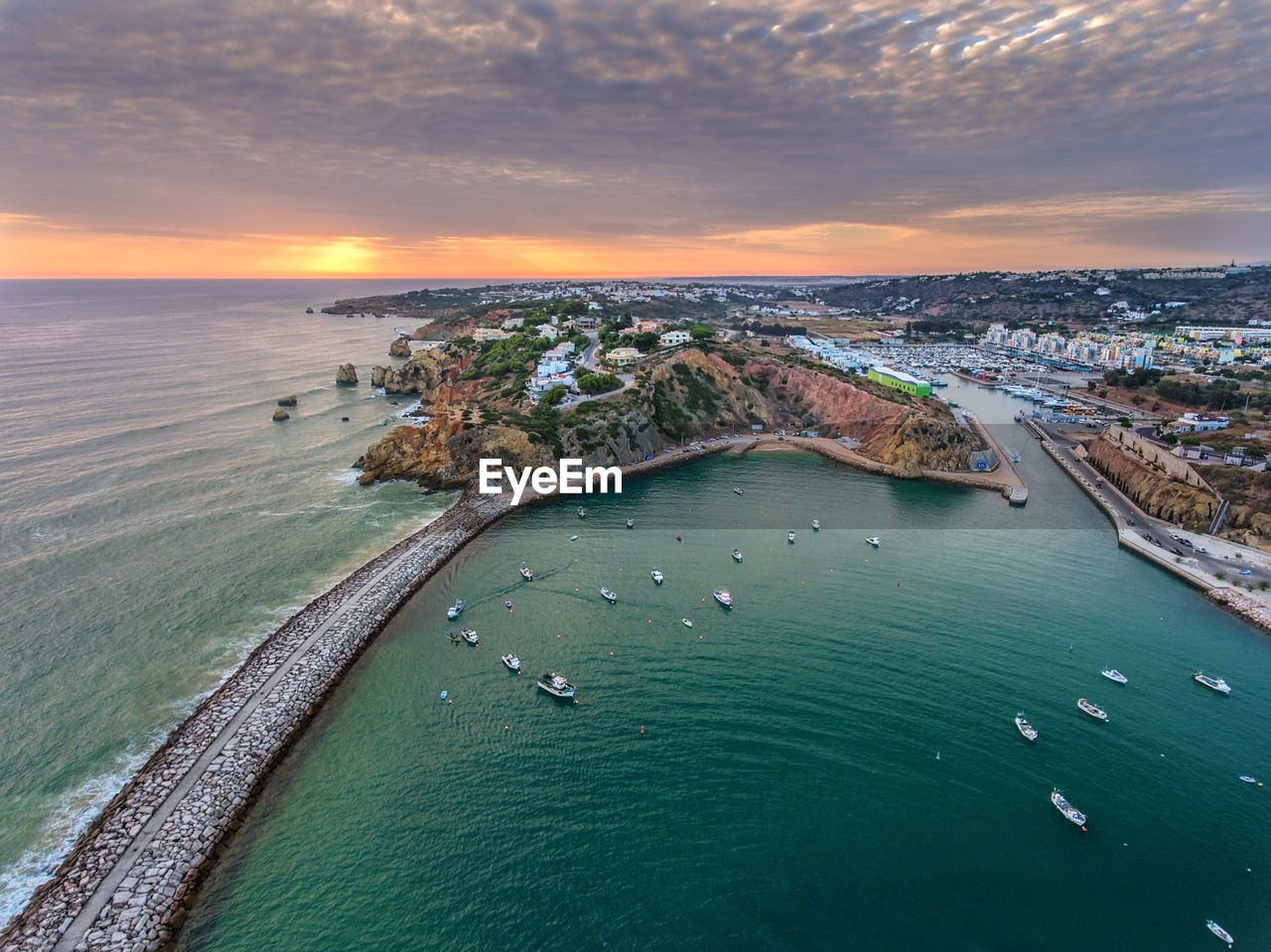 High angle view of sea against sky during sunset