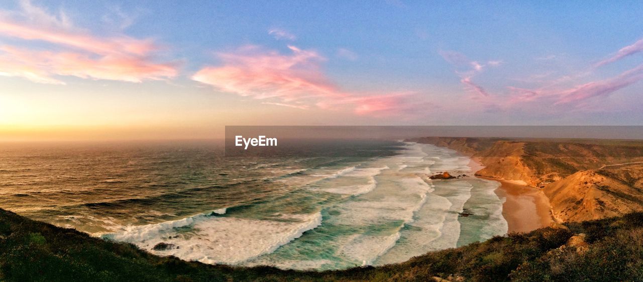 SCENIC VIEW OF SEA DURING SUNSET