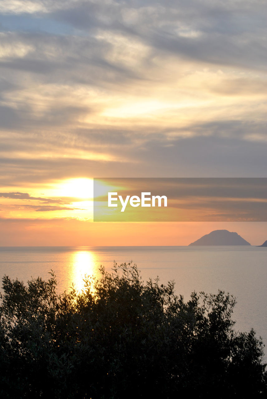 SCENIC VIEW OF SEA DURING SUNSET