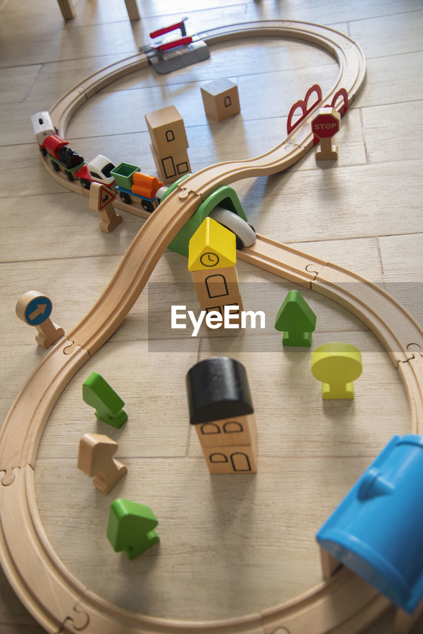 indoors, high angle view, wood, toy, no people, flooring