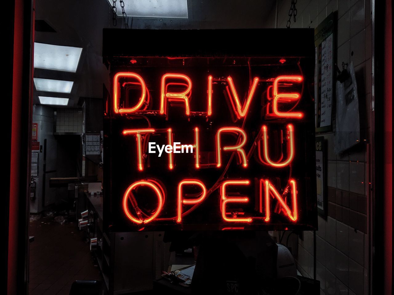 CLOSE-UP OF ILLUMINATED INFORMATION SIGN