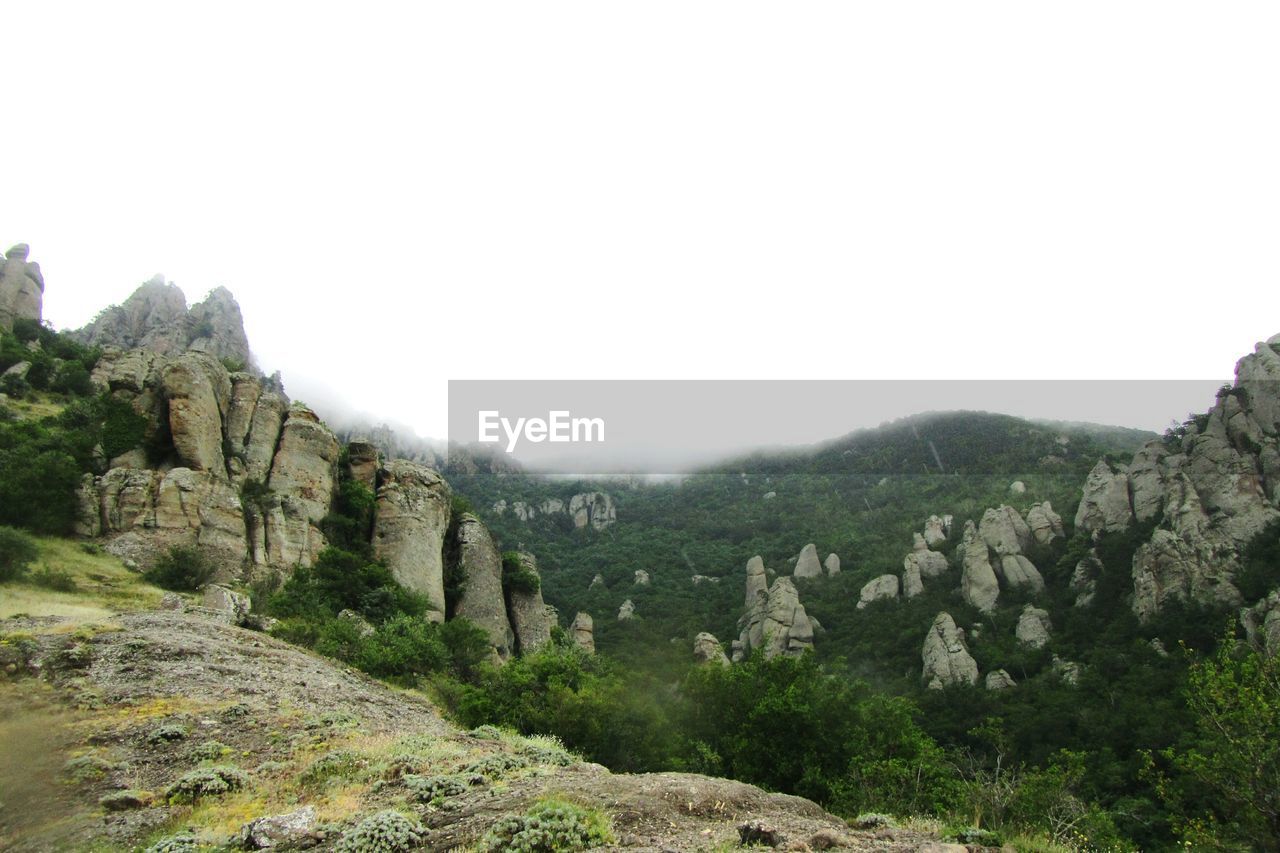 Scenic view of mountains against clear sky