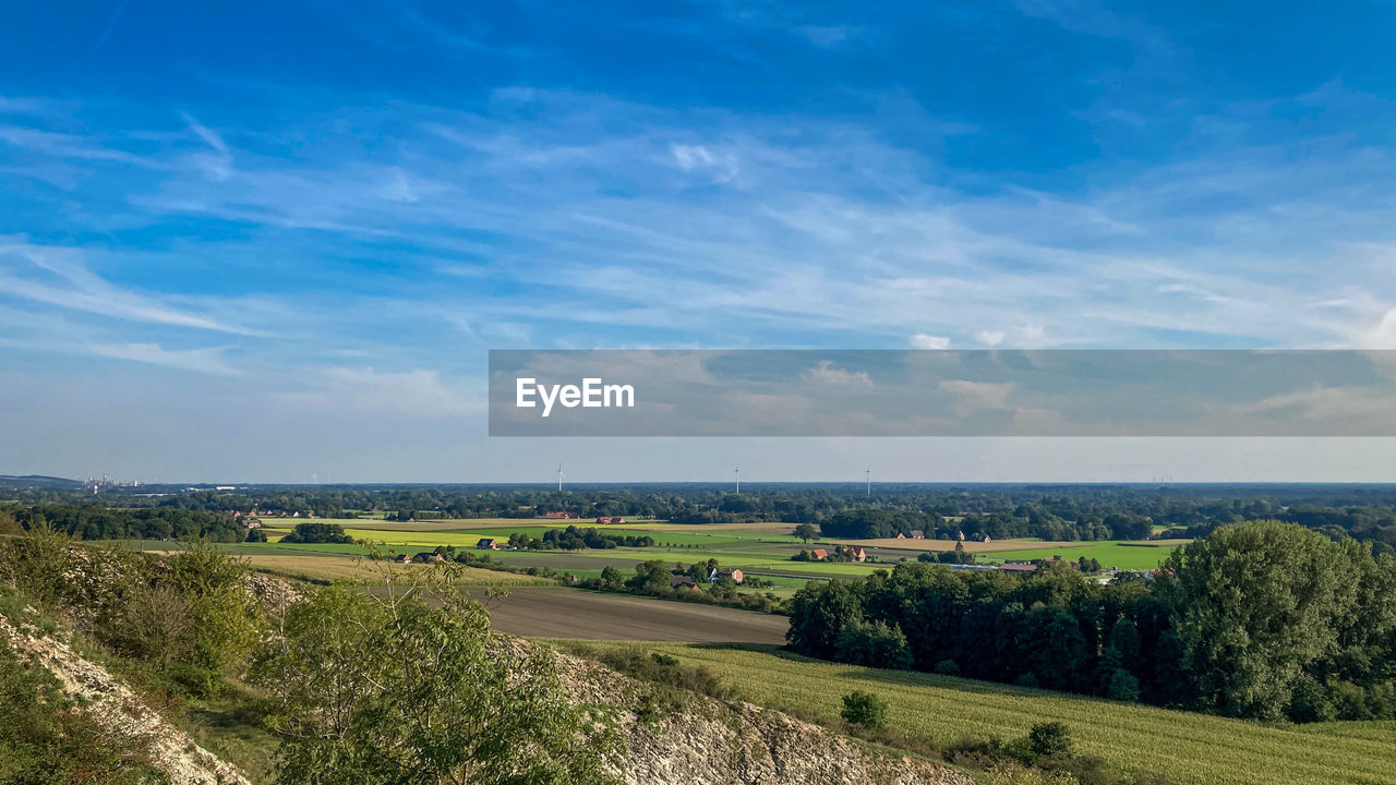 SCENIC VIEW OF FARM AGAINST SKY