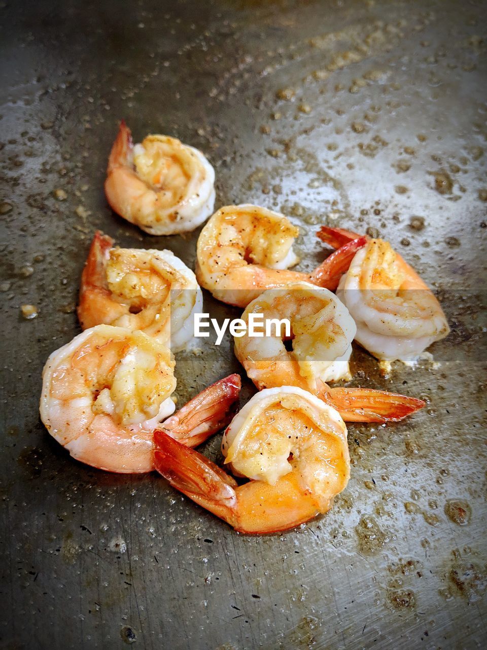 HIGH ANGLE VIEW OF SEAFOOD ON GRILL
