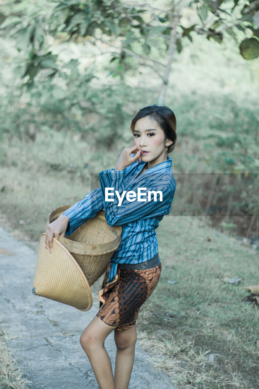 Ladies farm worker wearing traditional clothing of java