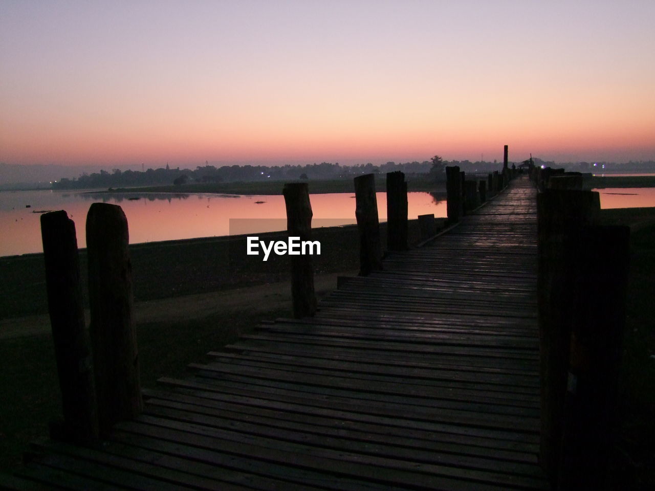 PIER OVER SEA AGAINST SKY