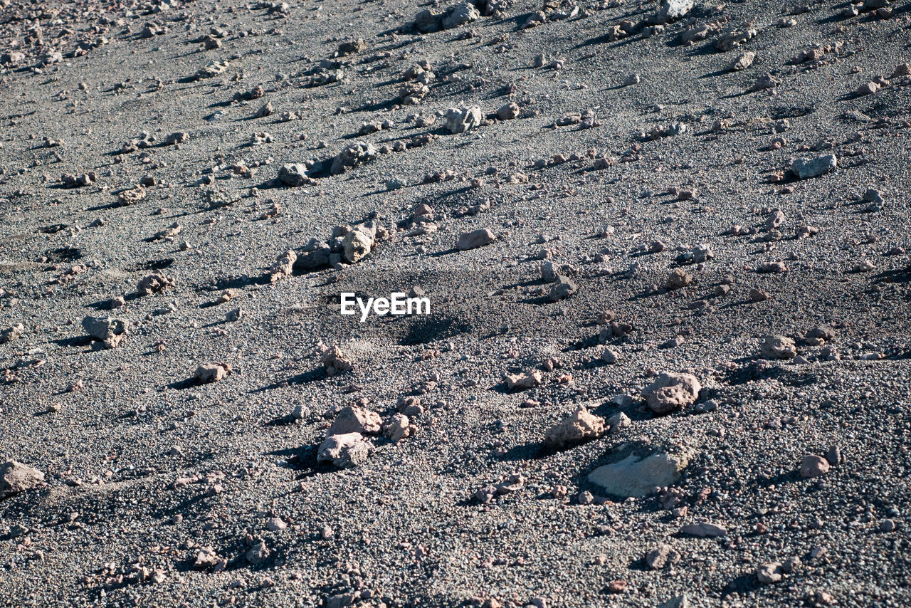 Full frame shot of stones on field