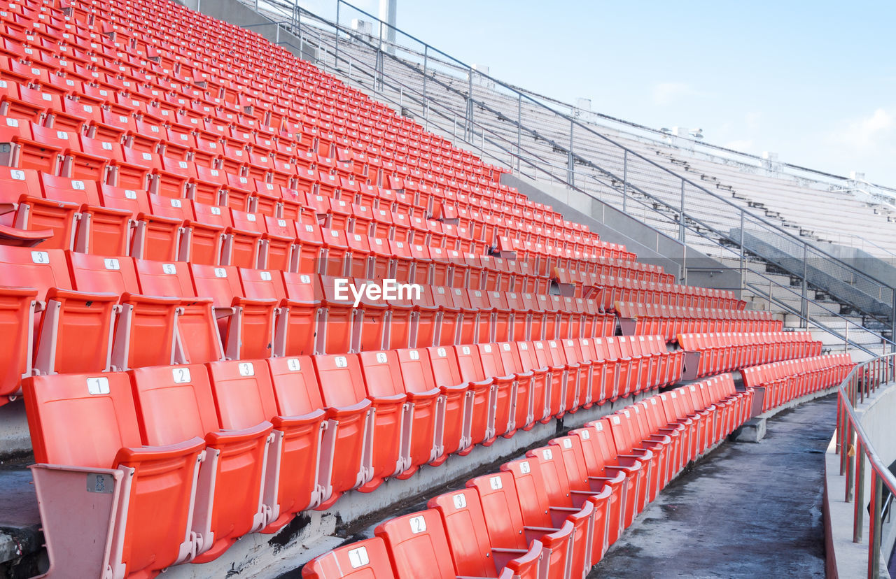 VIEW OF EMPTY CHAIRS IN ROW