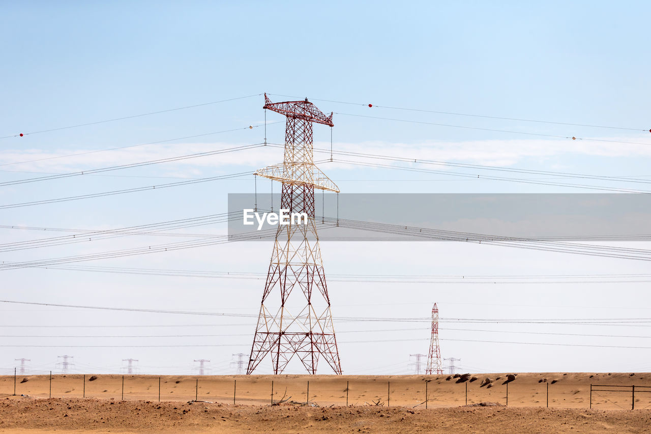 LOW ANGLE VIEW OF ELECTRICITY PYLON AGAINST SKY