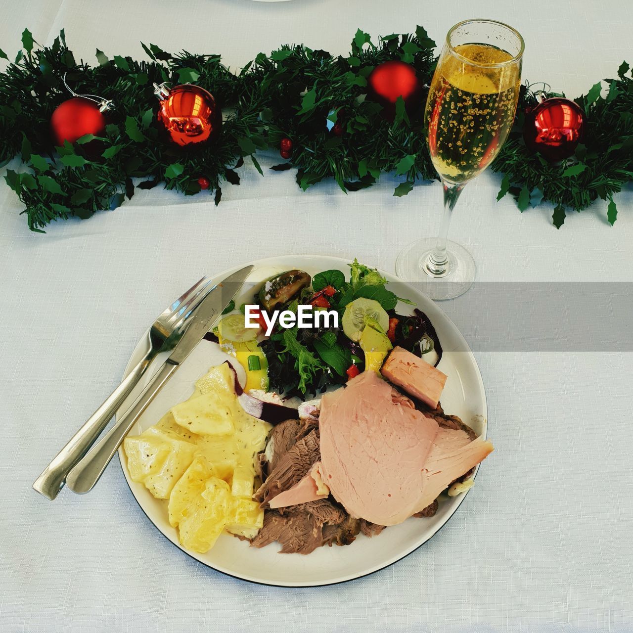 Here we have a traditional aussie christmas dinner with a glass of bubbly. 