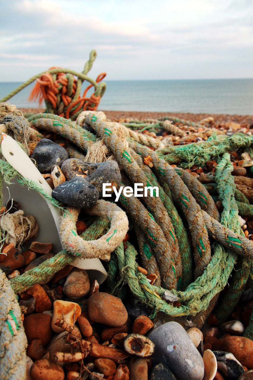 Environmental damage on beach plastic fishing waste . 
