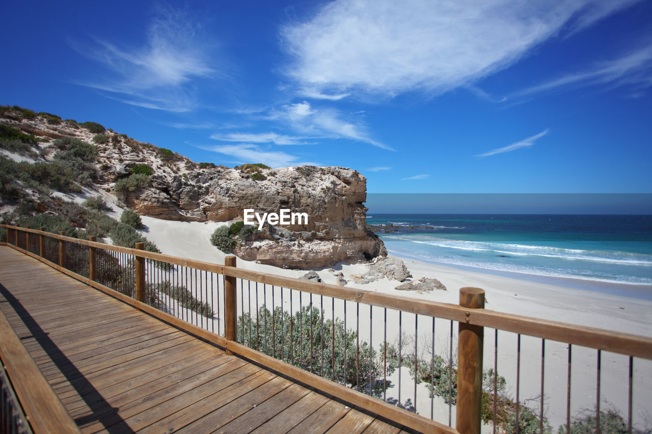 Scenic view of sea against blue sky