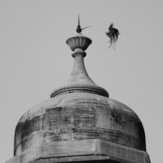 LOW ANGLE VIEW OF BUILT STRUCTURES AGAINST CLEAR SKY