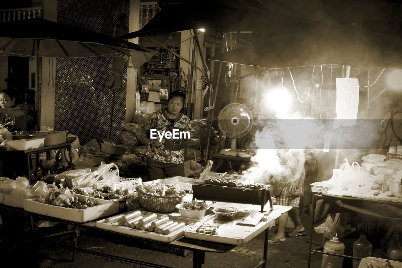 food, business, occupation, night, food and drink, table, illuminated, monochrome, market, market stall