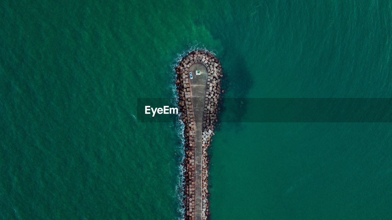 High angle view of ship sailing in sea