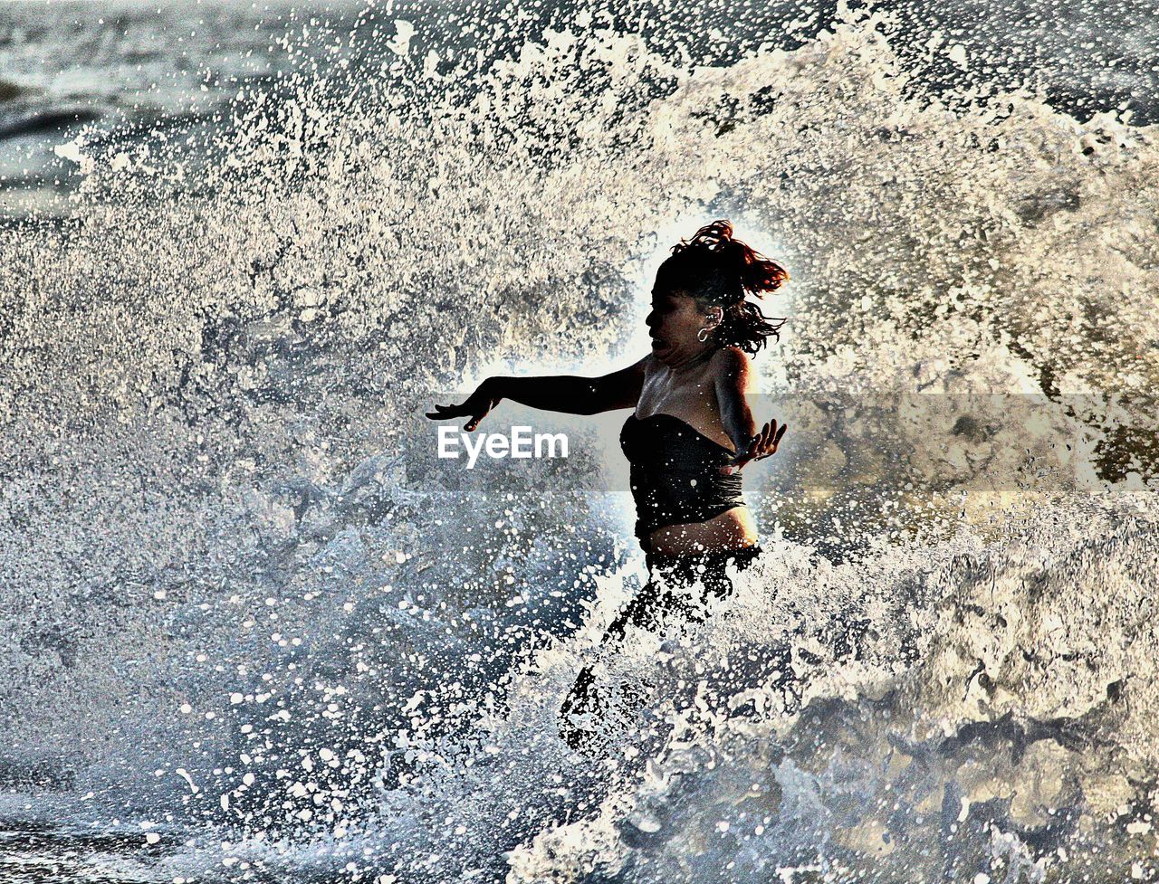 Woman running in sea