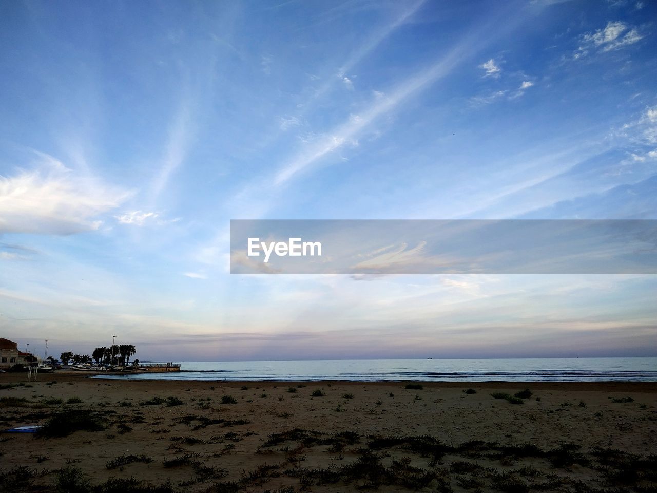 SCENIC VIEW OF SEA AGAINST BLUE SKY