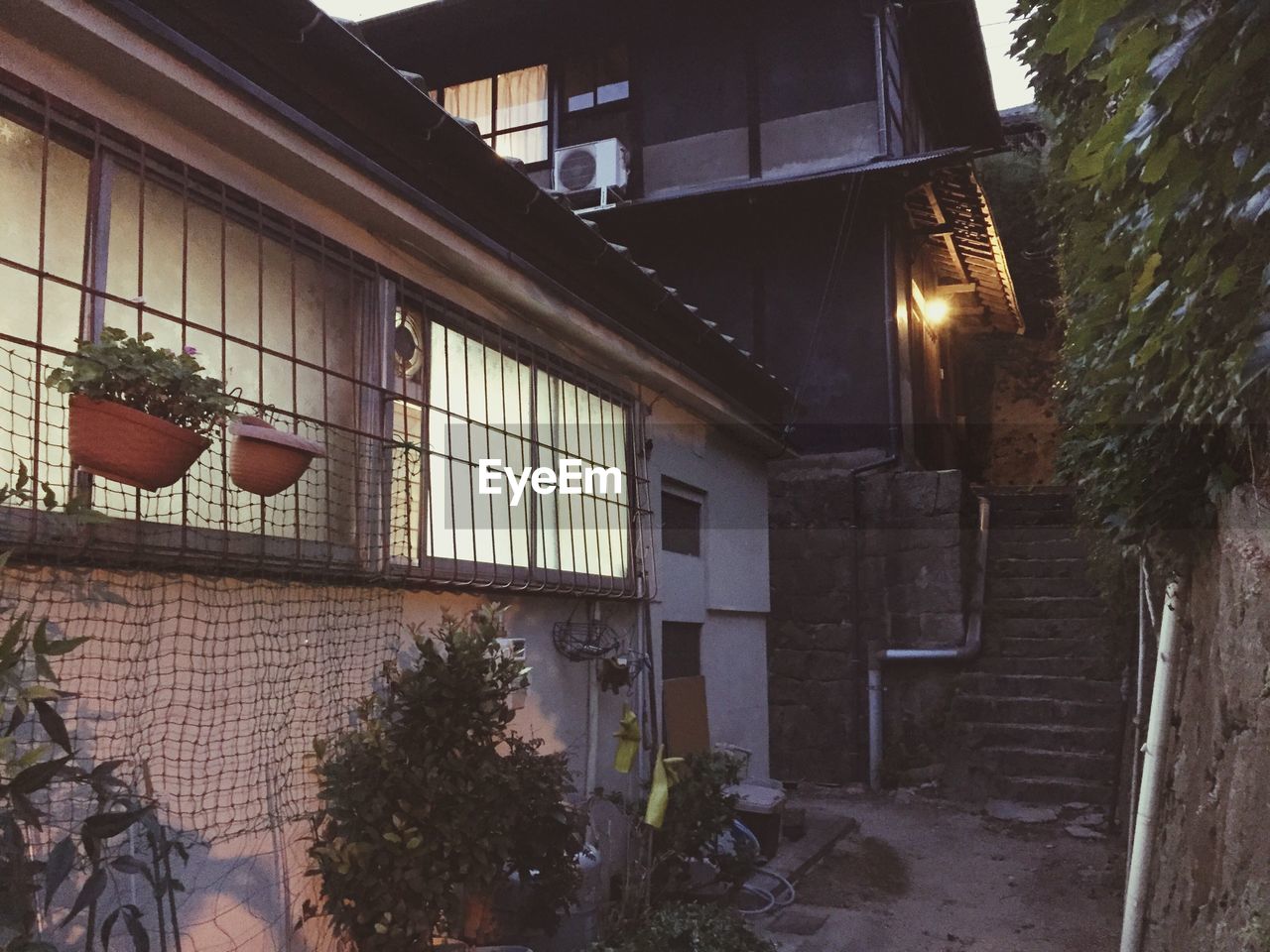 LOW ANGLE VIEW OF OLD BUILDING BY STREET