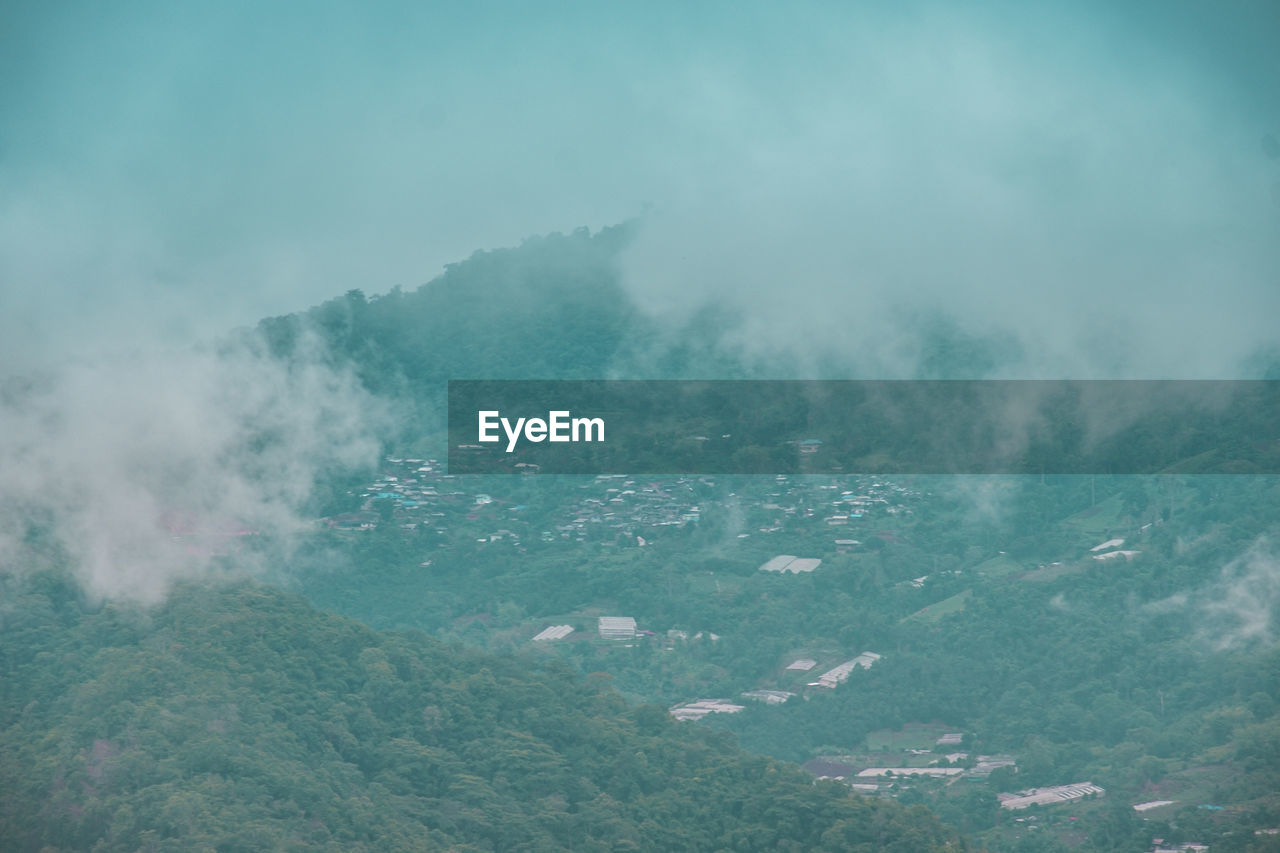 AERIAL VIEW OF LANDSCAPE AND MOUNTAINS