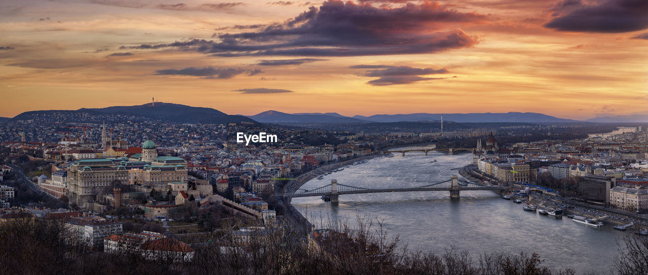 high angle view of city at sunset