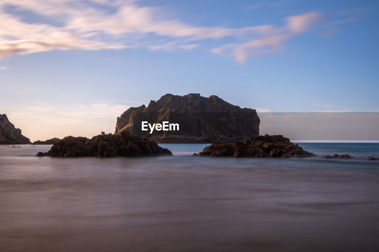 scenic view of sea against sky at sunset