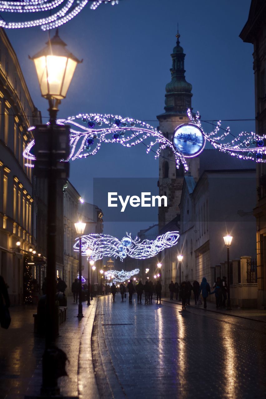 Illuminated city buildings at night