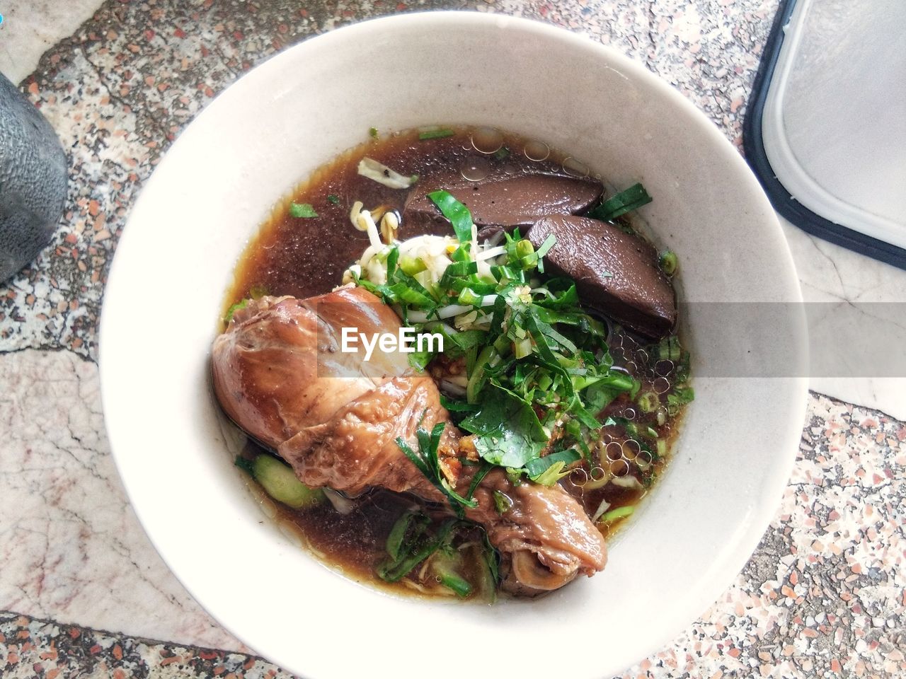 High angle view of noodle soup in bowl on table