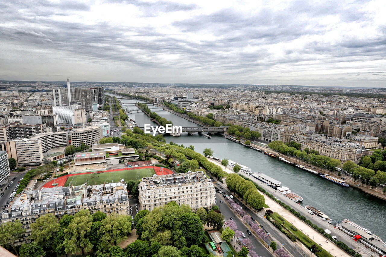 High angle view of river amidst buildings in city