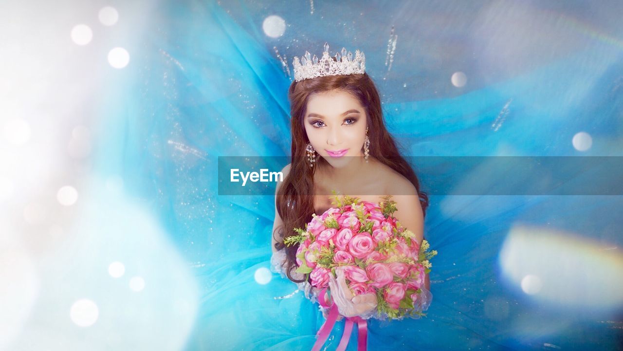 High angle view of bride wearing crown during wedding