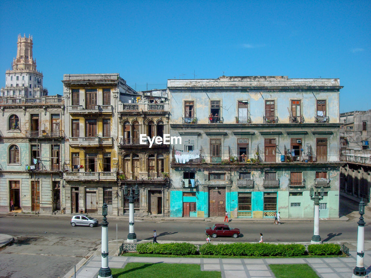 BUILDING AGAINST CLEAR BLUE SKY