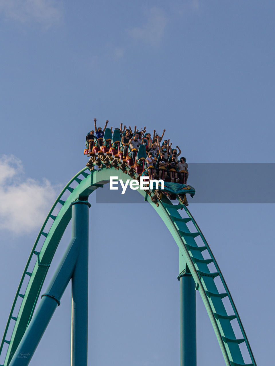 Low angle view of rollercoaster against sky