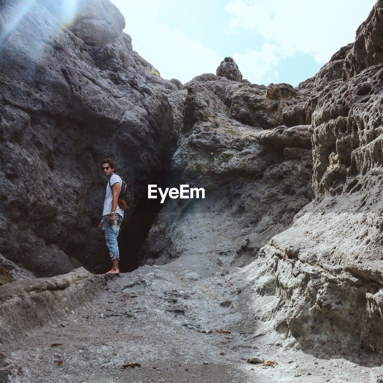 Man standing on rock formation