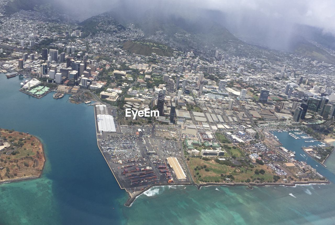 Aerial view of cityscape and sea