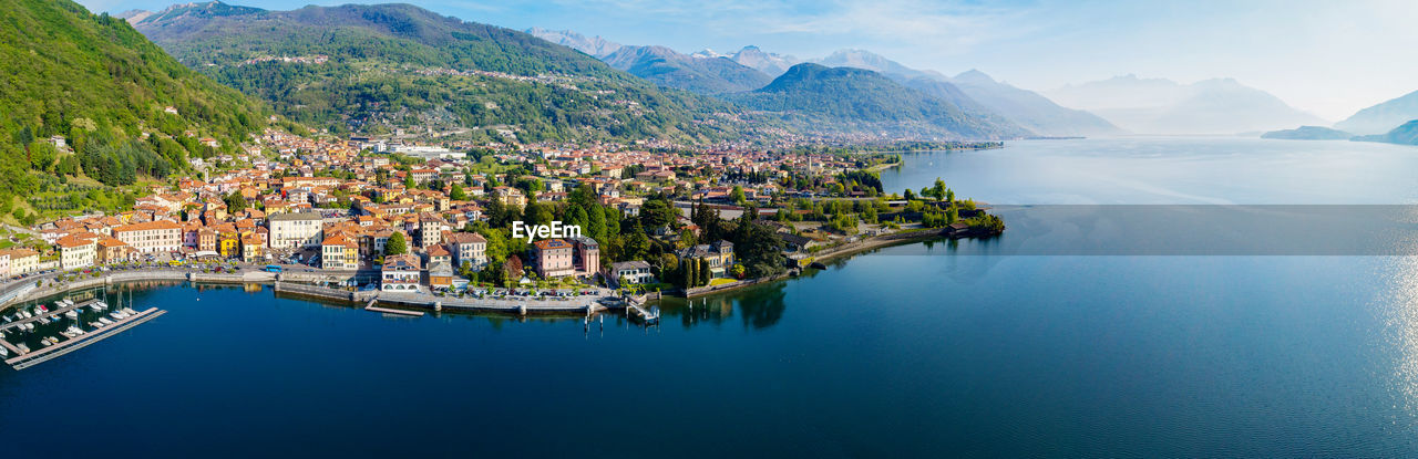 PANORAMIC SHOT OF TOWNSCAPE BY SEA