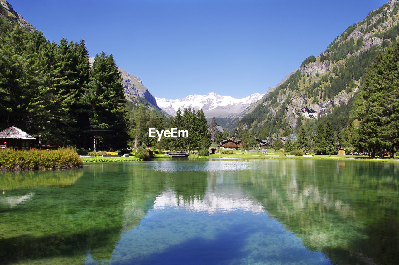 View of lake gover near  the mountains of valle d'aosta, gressoney-saint-jean, valle d'aosta, italy