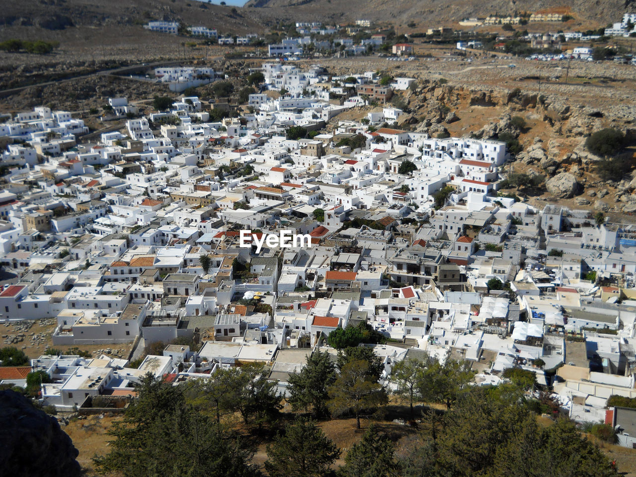 HIGH ANGLE VIEW OF BUILDINGS IN A CITY