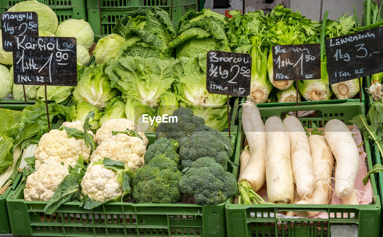 Broccoli, cauliflower and radish for sale at a market