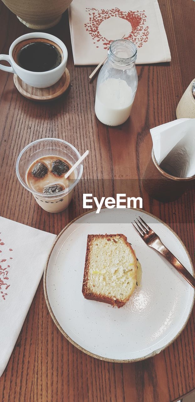 HIGH ANGLE VIEW OF COFFEE ON PLATE