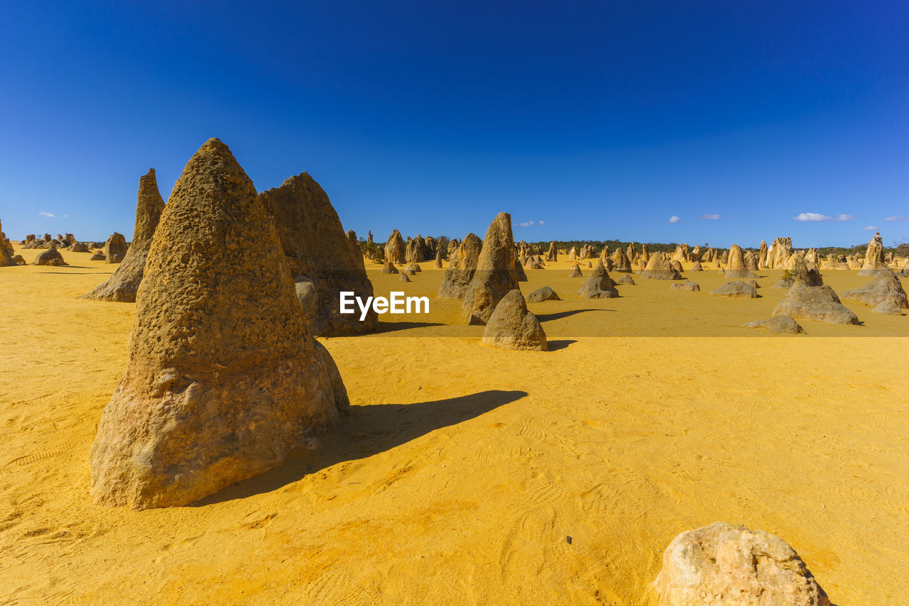 VIEW OF ROCK FORMATIONS AGAINST SKY