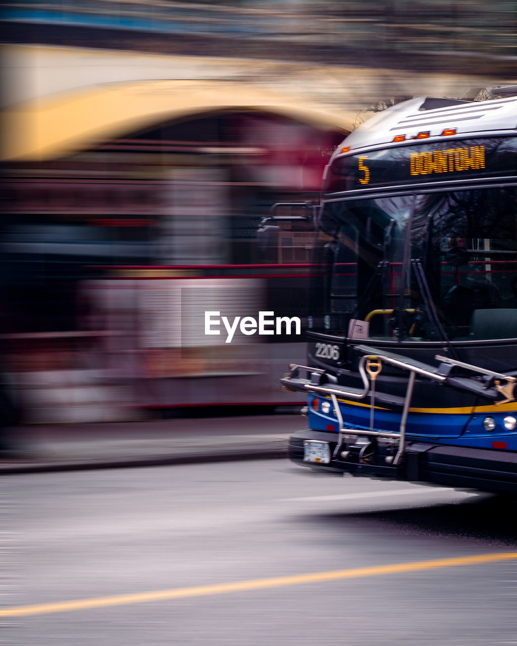 BLURRED MOTION OF CAR ON STREET