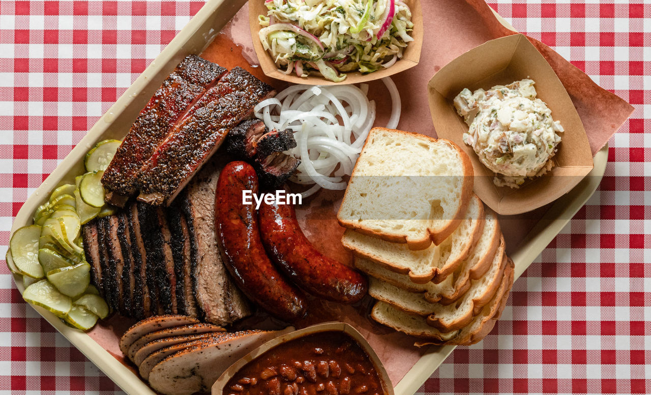 Barbecue tray full of smoked meats