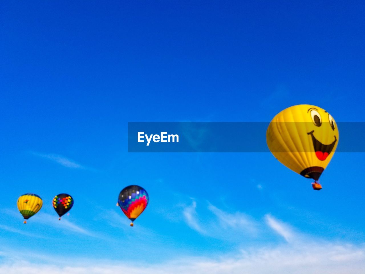 LOW ANGLE VIEW OF HOT AIR BALLOON AGAINST SKY