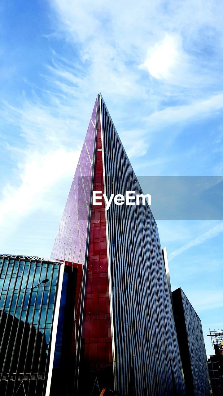 LOW ANGLE VIEW OF MODERN BUILDINGS AGAINST SKY