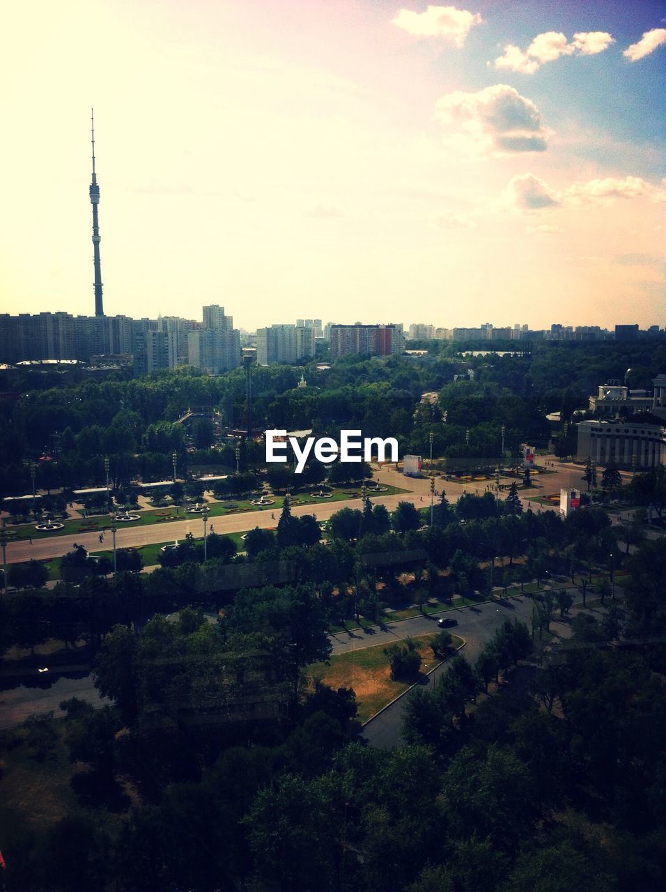 High angle view of park and buildings in city