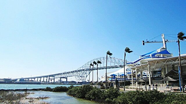 BRIDGE OVER RIVER AGAINST CLEAR SKY