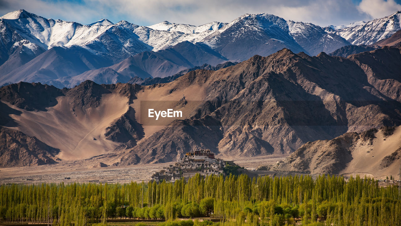 Scenic view of snowcapped mountains against sky